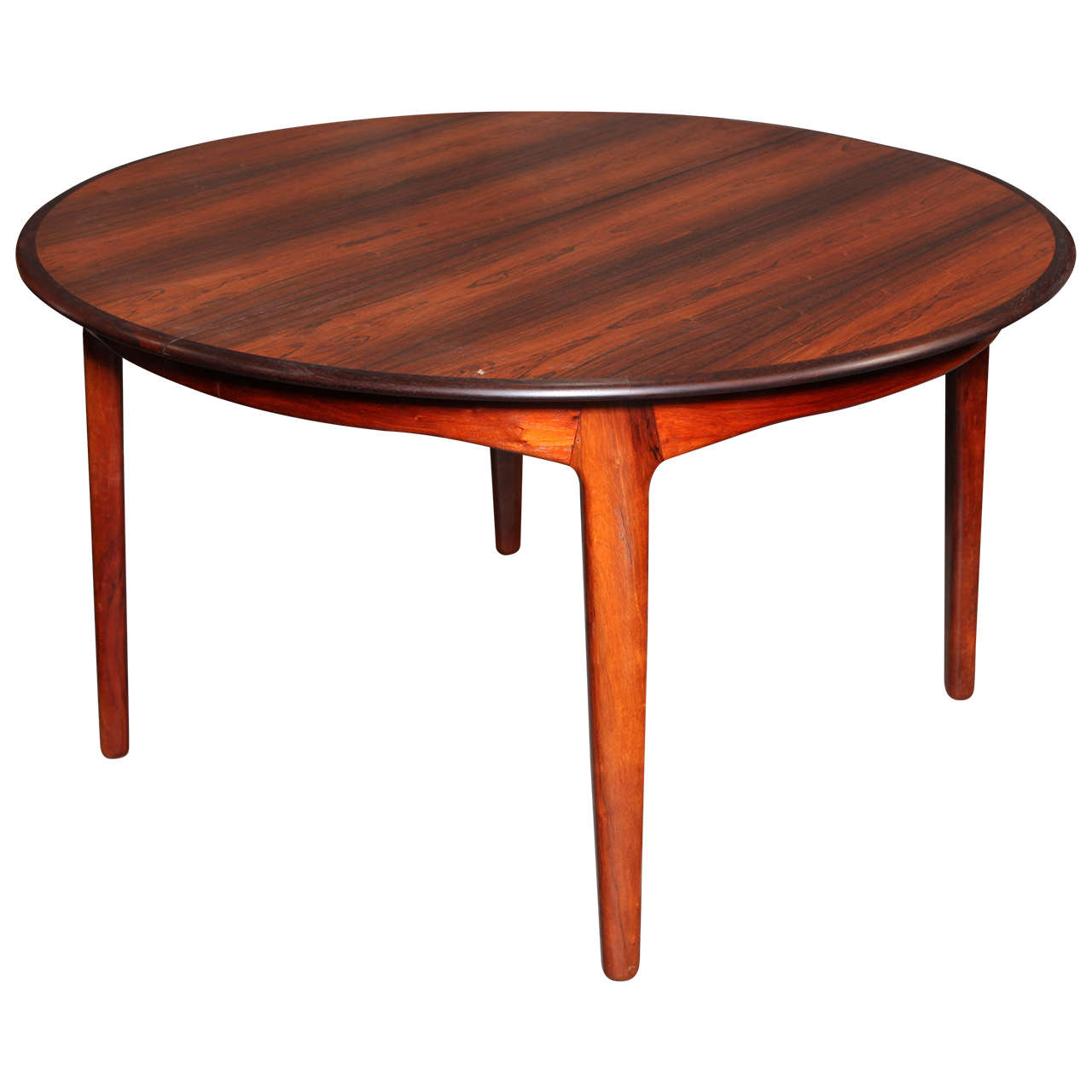 Round Dining Table by Henning Kjaernulf, with Four Leaves