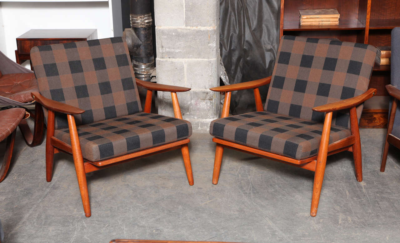 Vintage 1960s Hans Wegner GE-260 Easy Chair (pair)

This pair of Hans Wegner Lounge Chairs are in excellent condition. The cushions are the original spring cushions which are the most desired. They are incredibly comfortable and repairable if