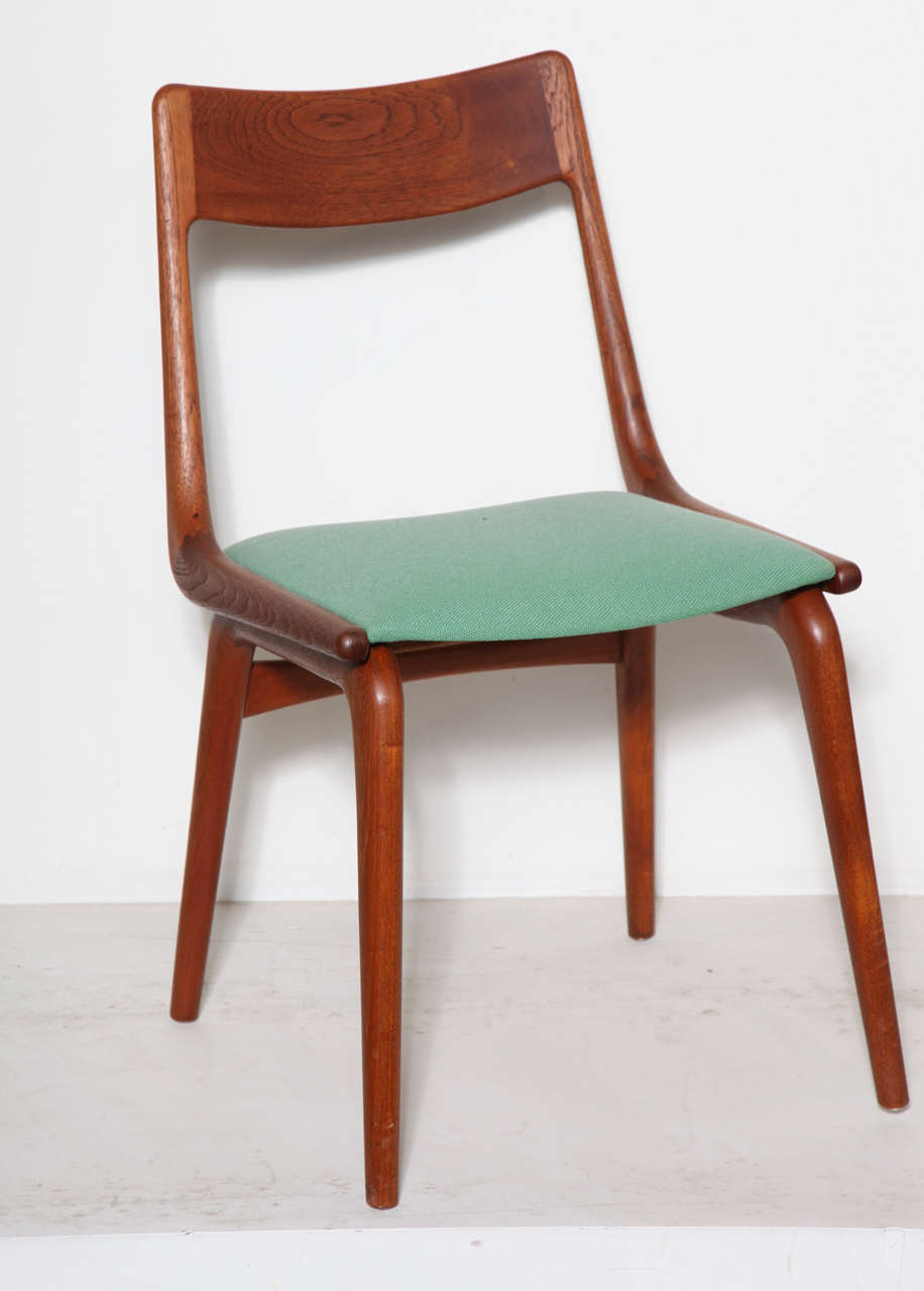 Vintage 1950s Teak Dining Chairs by Erik Christiansen

These Atomic Dining Chairs frames are in excellent, like-new condition. We can re-upholster them in another fabric or leather if you prefer for an extra fee. Definitely one of my personal