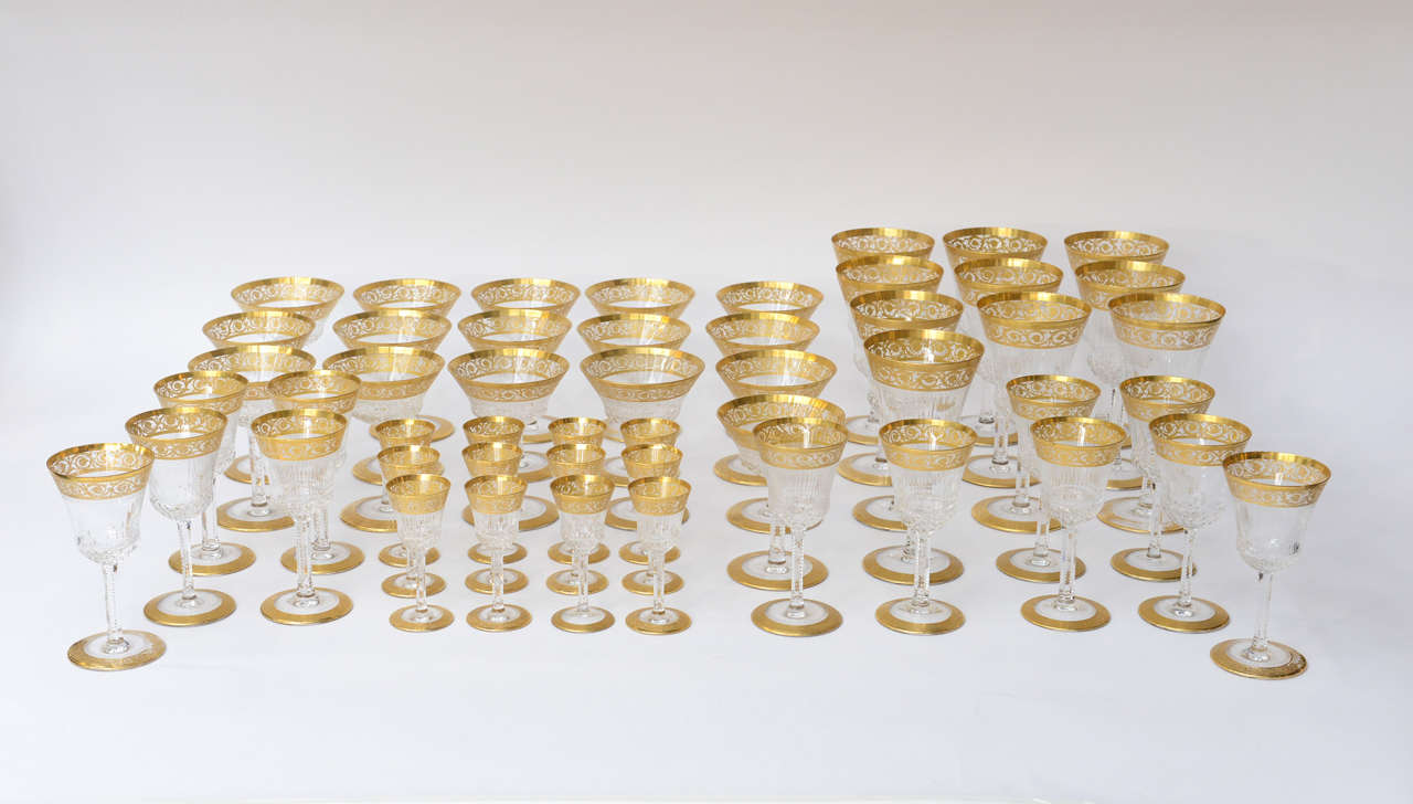 Fifty piece collection of exquisite St. Louis gilt crystal glassware.  
This set comprises:
10 lg. wine - 7