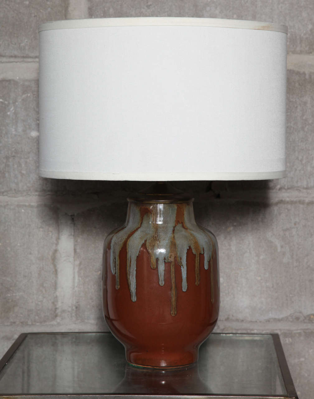 Pair of petite of drip glaze ceramic, beautiful blend of colors. Rich earth tone base.
Shades not included. 100 watts or LED ready.
Lamps are 8 inches tall, shown with 13 x 13 x 8 shades. Total height with shades is 16 inches tall. Please call us