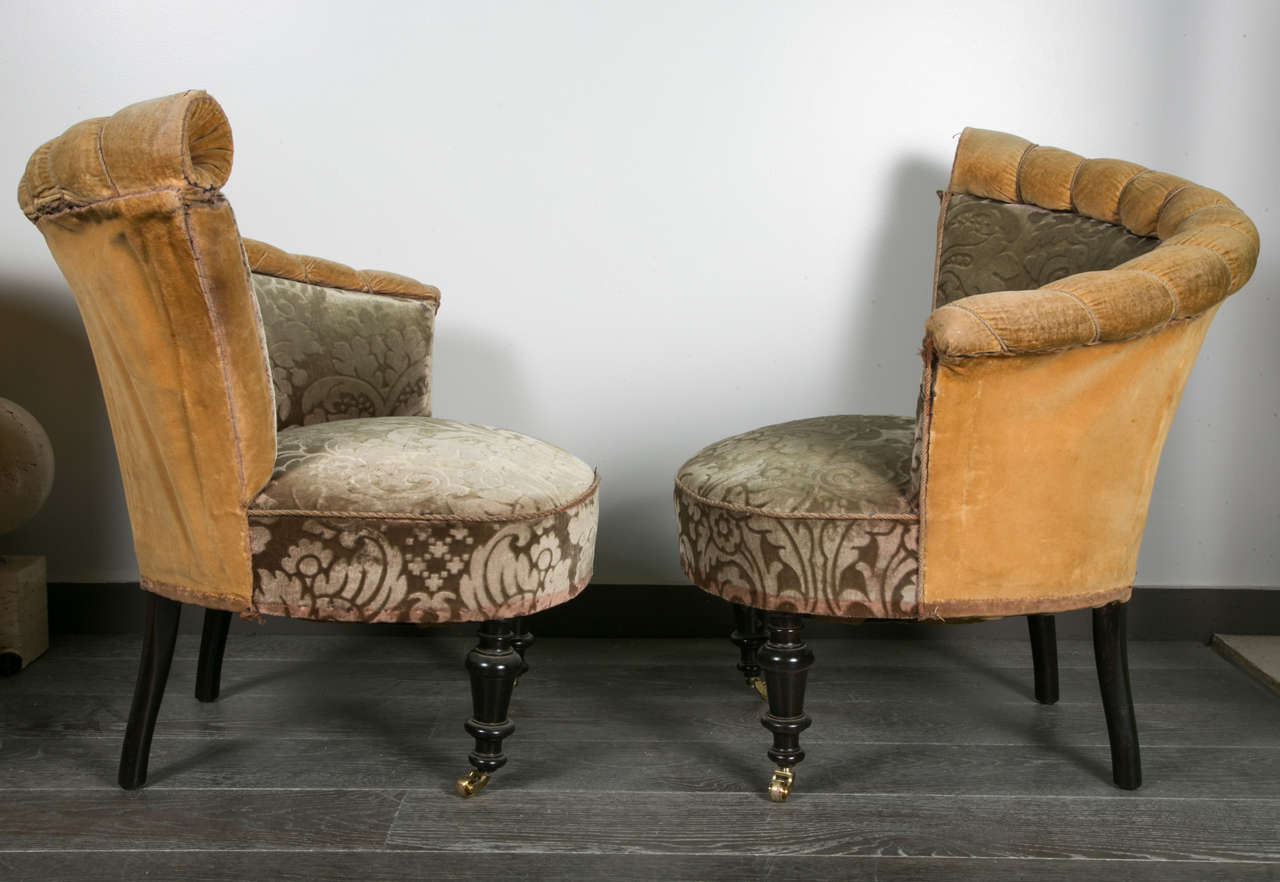 Pair of slipper chairs with elegant design .
Circa 1880