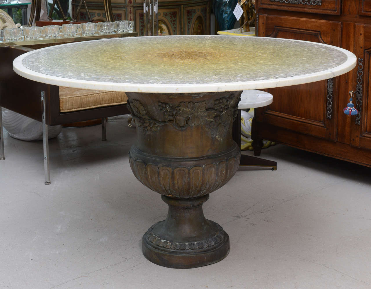 Signed Italian Niccolini metallic glass tiled table with an ornate pedestal bronze base. The tile palette ranges from off white to metallic gold.