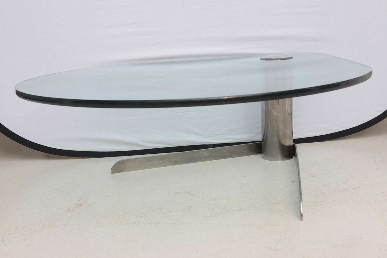 Sleek retro steel and glass Pace coffee table with triangular projecting glass.