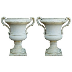 Pair of Painted Cast Iron Regency Urns with Volute Handles