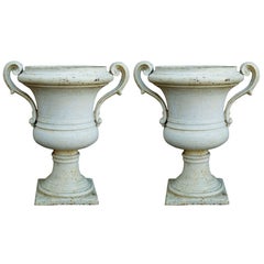 Pair of Painted Cast Iron Regency Urns with Volute Handles