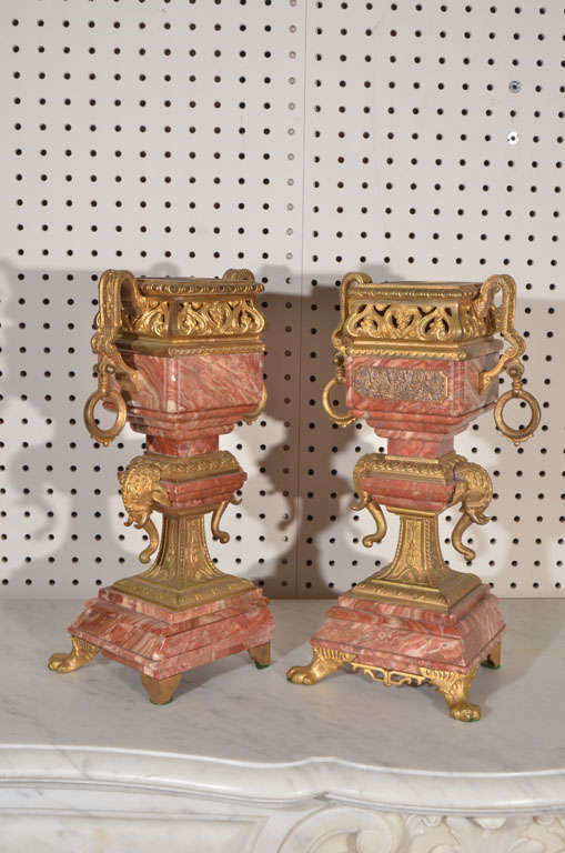 pink marble and bronze pair of urns