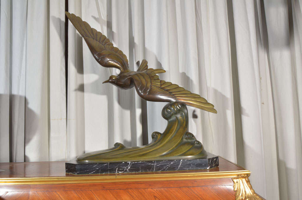 bronze bird sculpture