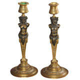 Pair of bronze figural candlesticks