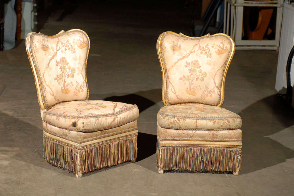Pair of 19th century fireside slipper chairs.
