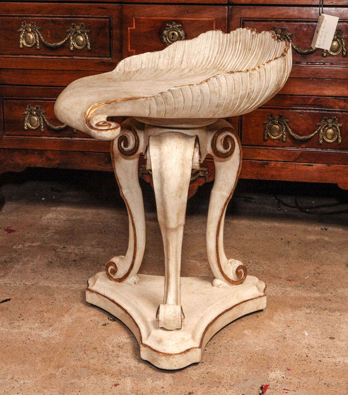 Hand-painted, parcel-gilt, tripod, Venetian grotto stool with adjustable, shell-style seat.