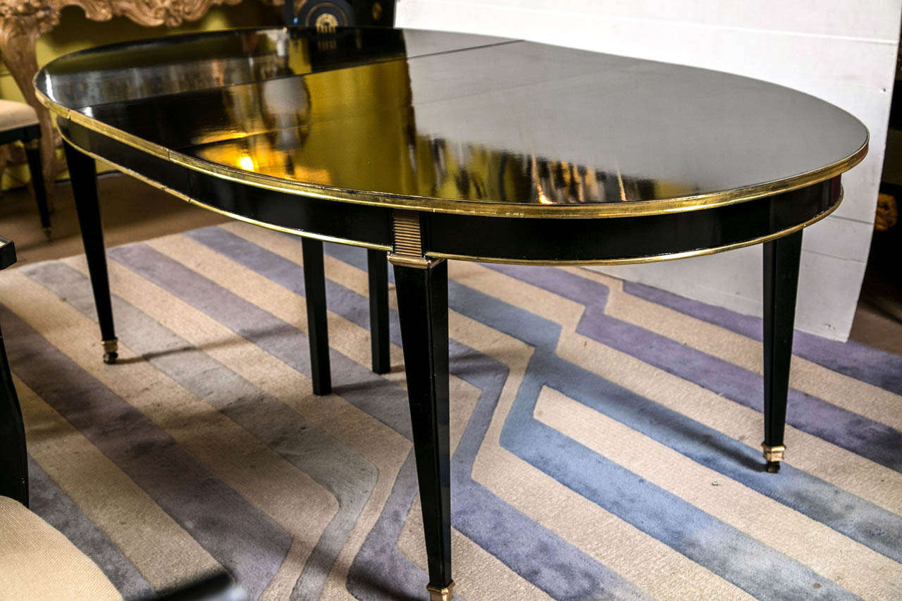 A Maison Jansen Three Leaf Ebonized Dining Table In Good Condition In Stamford, CT