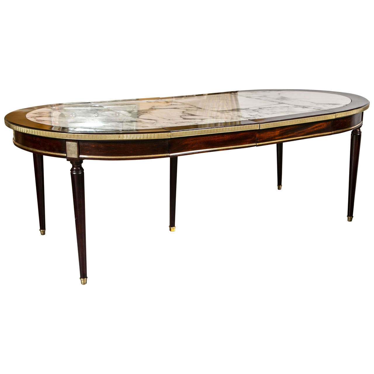 A Two Leaf Marble Top Dining Table by Maison Jansen