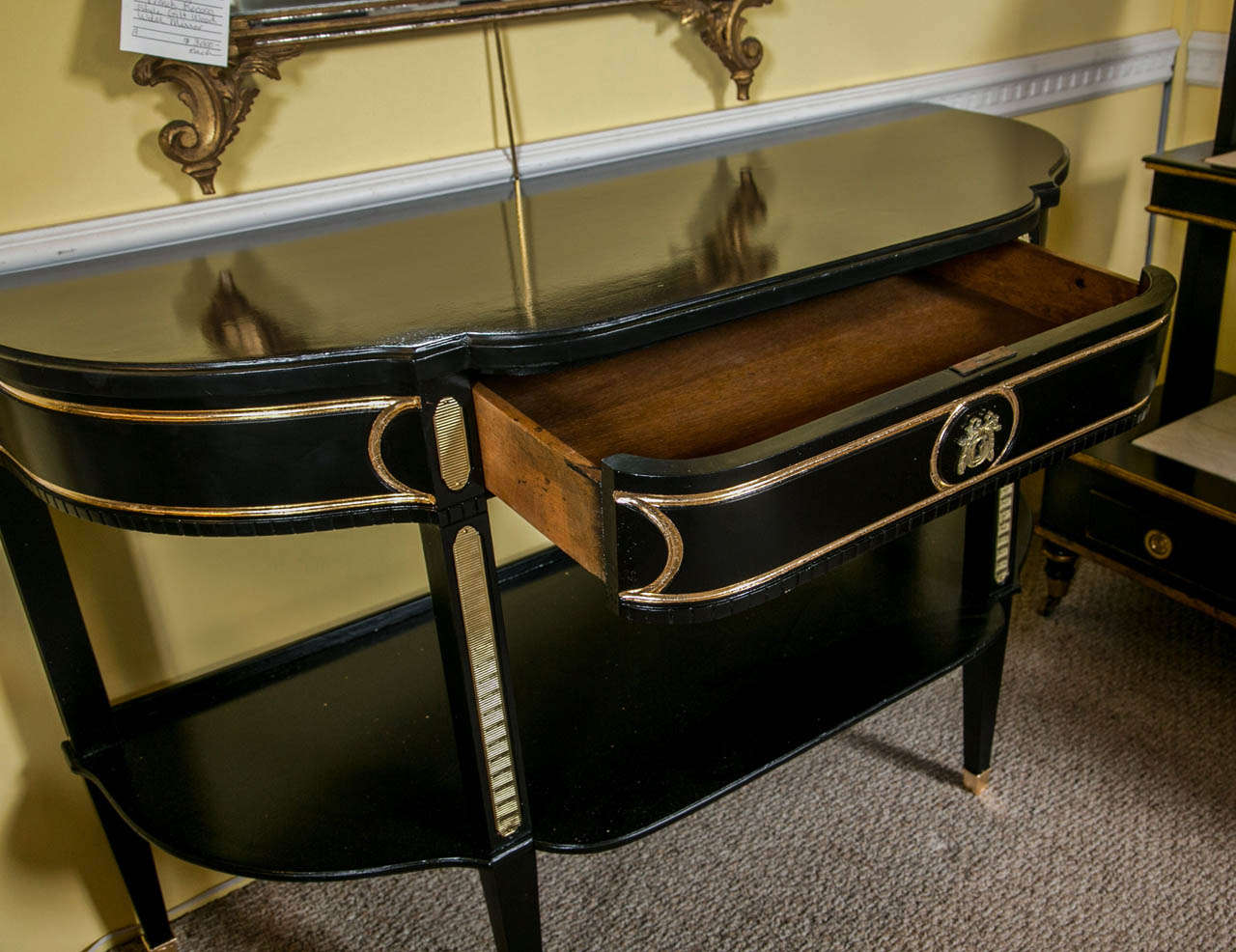 A Pair of Ebonized Bronze Mounted Consoles by Jansen 1