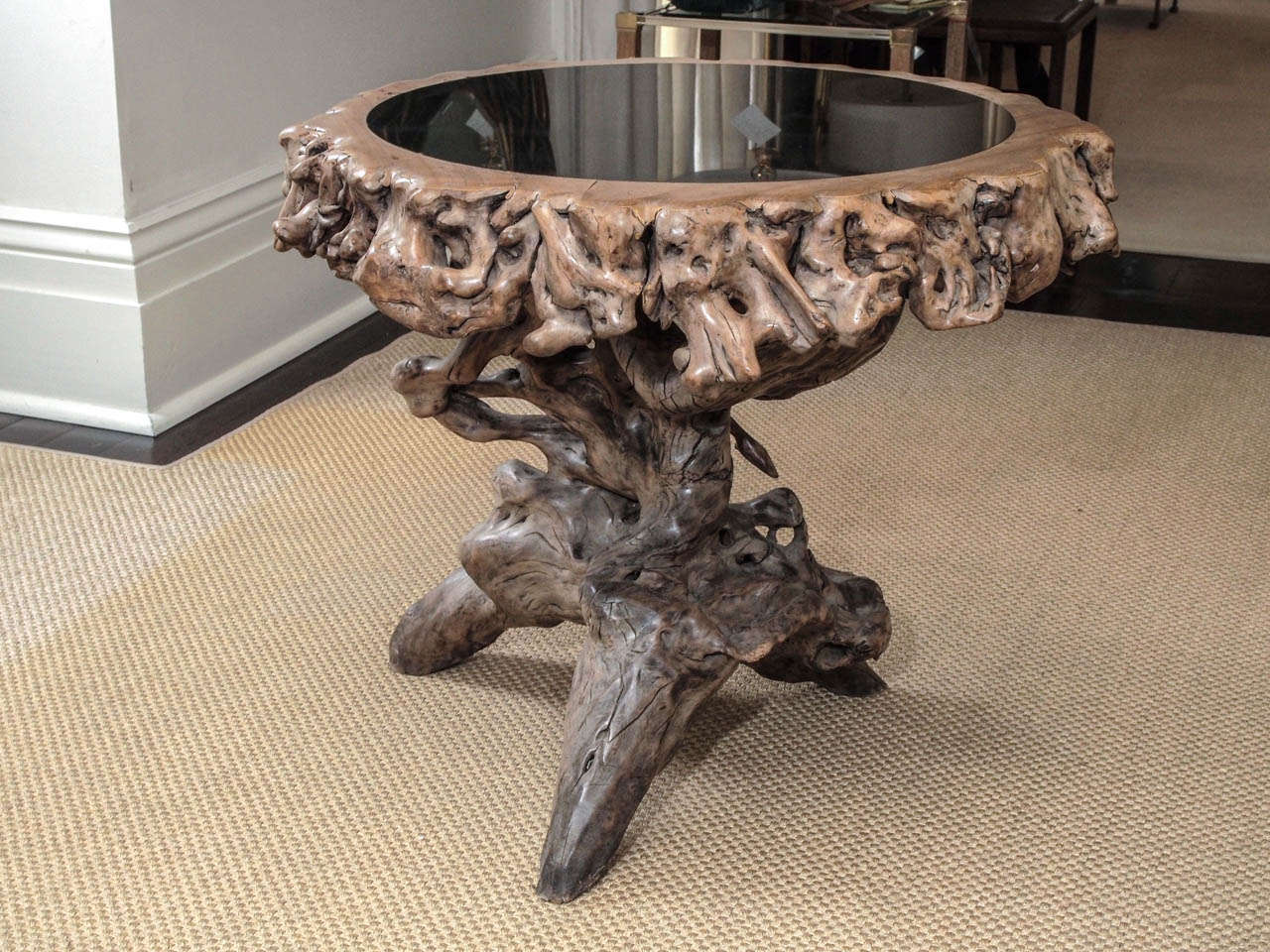 Unusual burlwood side/center table with black granite inlay at the plateau