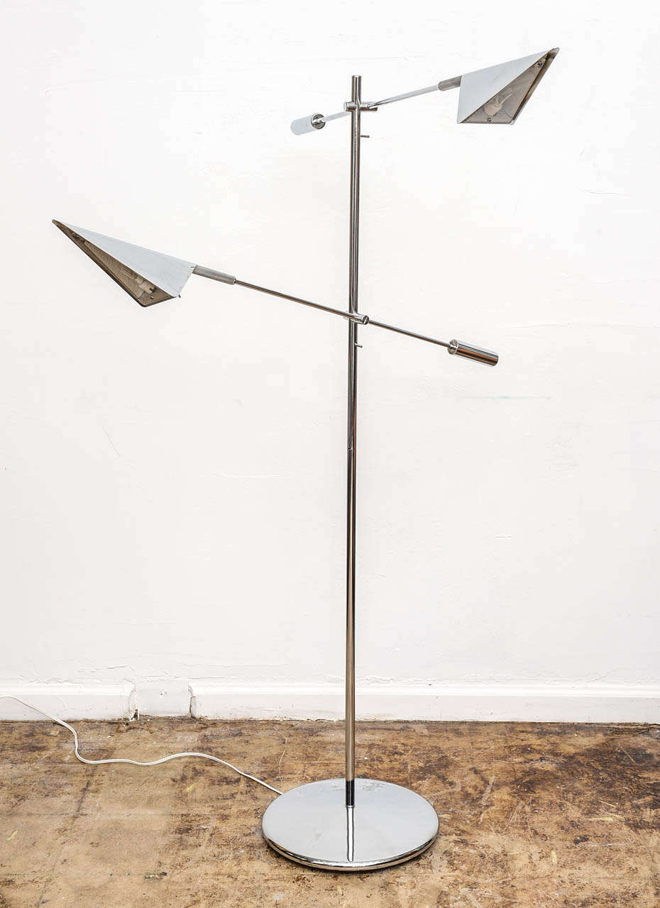 Beautiful Koch and Loewy floor lamp dating back to the late seventies , each arm has a three way switch , the lamp is in excellent all original condition.  A great addition to your minimal , MIDCENTURY or CLASIC interrior.