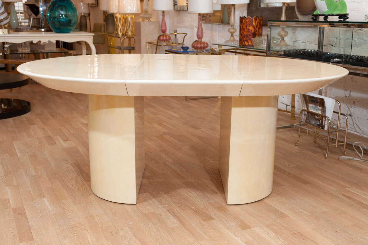 This decadent lacquered goatskin table with a single
removable leaf is perfect for
a stylish 