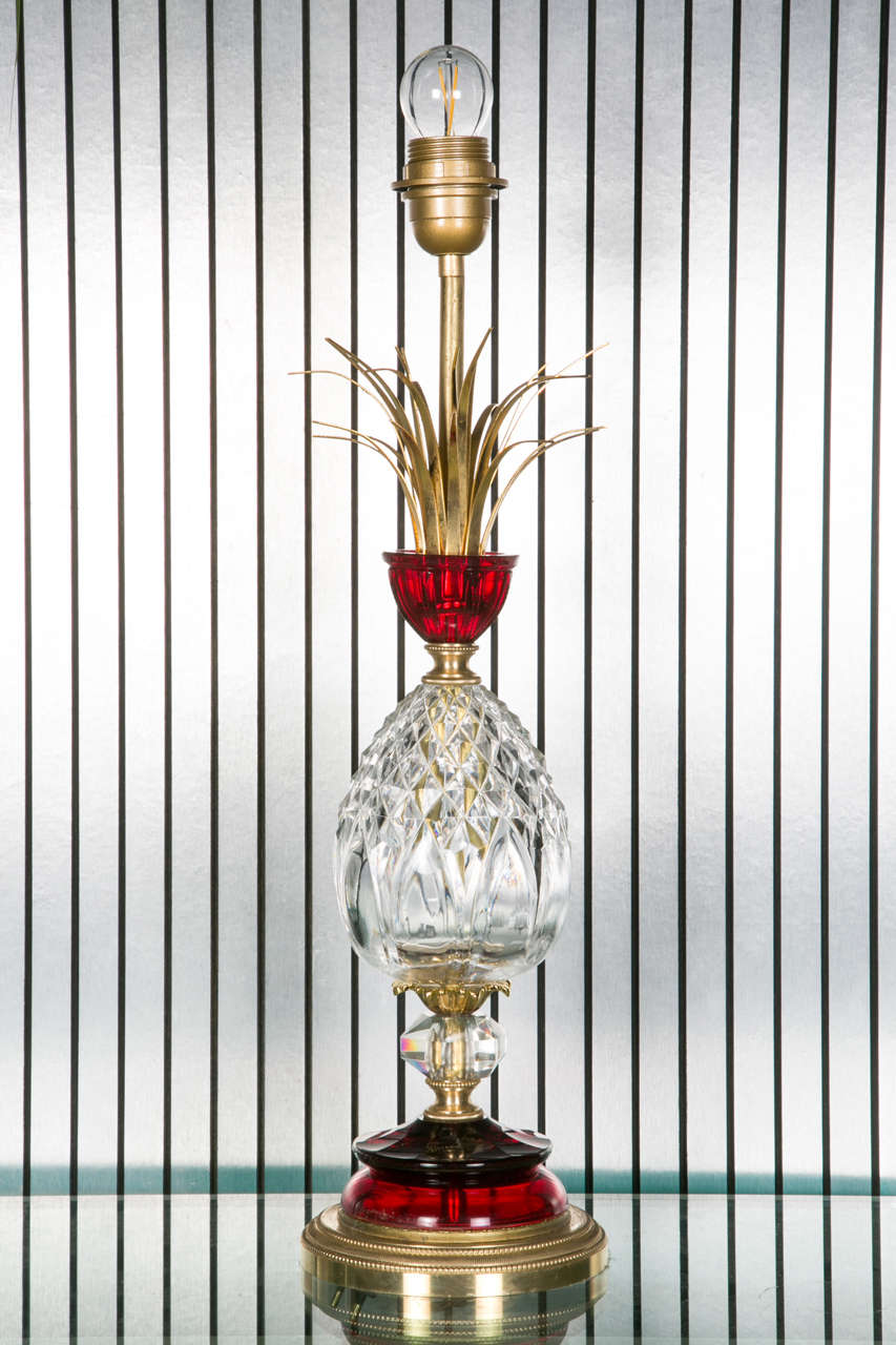 Pair of table lamps, thick-cut ruby-red and white crystal, probably Baccarat, 1950s, in shape of a pineapple, mounted with bronze.