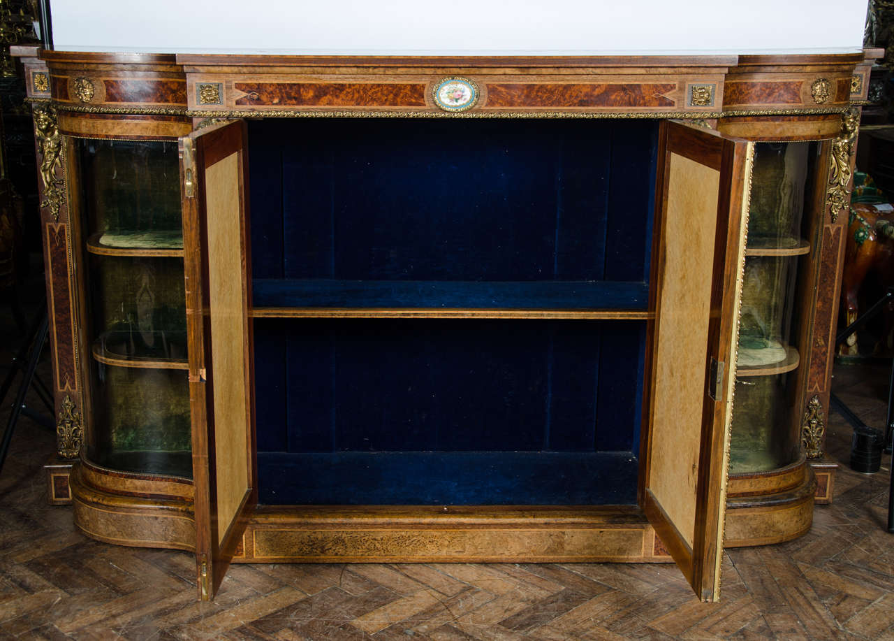 Walnut 19th Century bow fronted side cabinet with porcelain plaques. 77