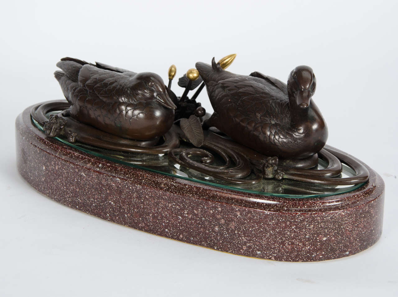 A rare Japanese, Meiji period (1868-1912) bronze study of two ducks swimming.