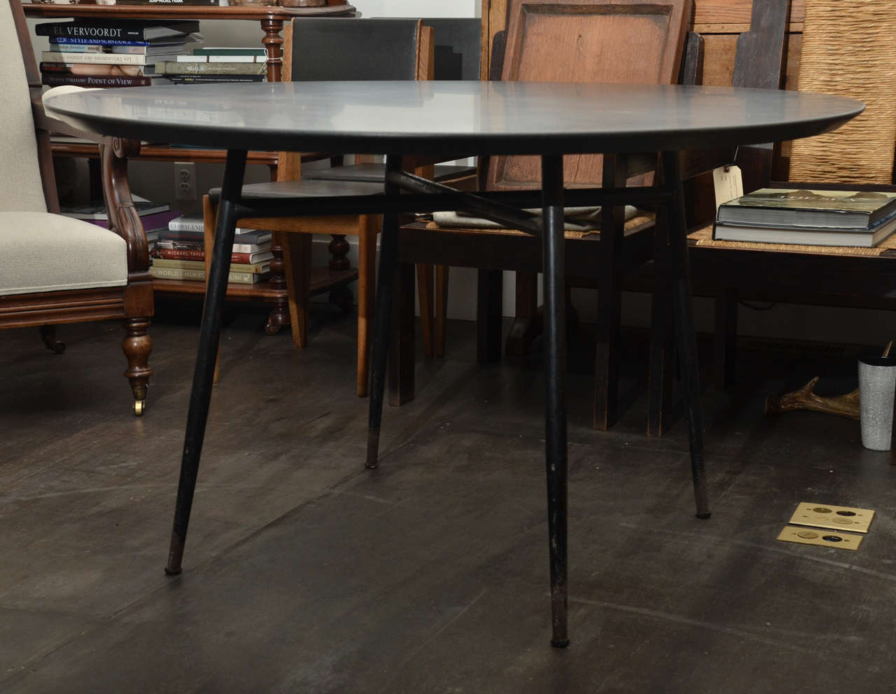 Vintage metal table base with original black powder coated finish - some patina on legs - Round table with contemporary absolute black granite top