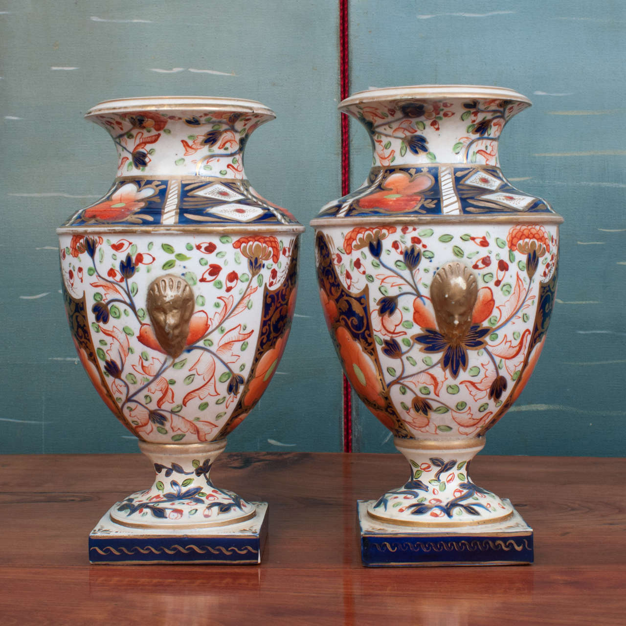 Ovid form vases - well marked in red on bottom of each urn - hybrid porcelain - these are old Derby marks prior to the company becoming Bloor Derby.