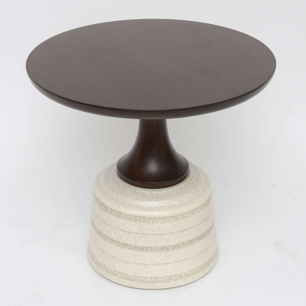 One of our favorite little side tables by John Van Koert for Drexel. Ceramic base and newly re-finished sculpted walnut top.