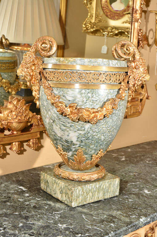 10th c Louis XVI marble and bronze dore planter. Beautiful rams head details