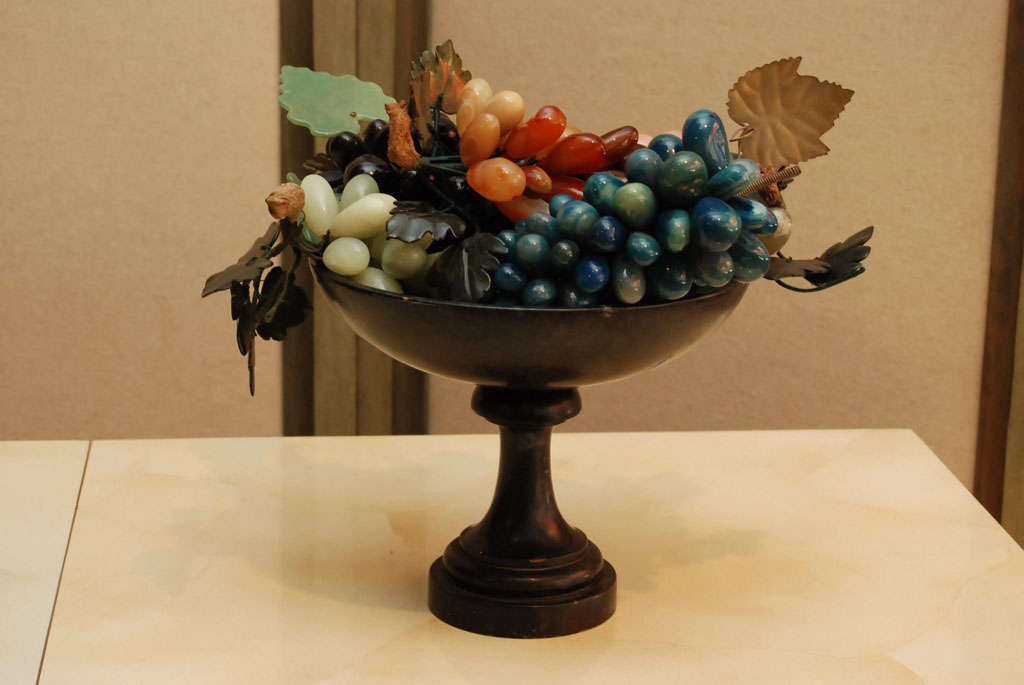 Here is a beautiful marble fruit centerpiece in an iron compote.