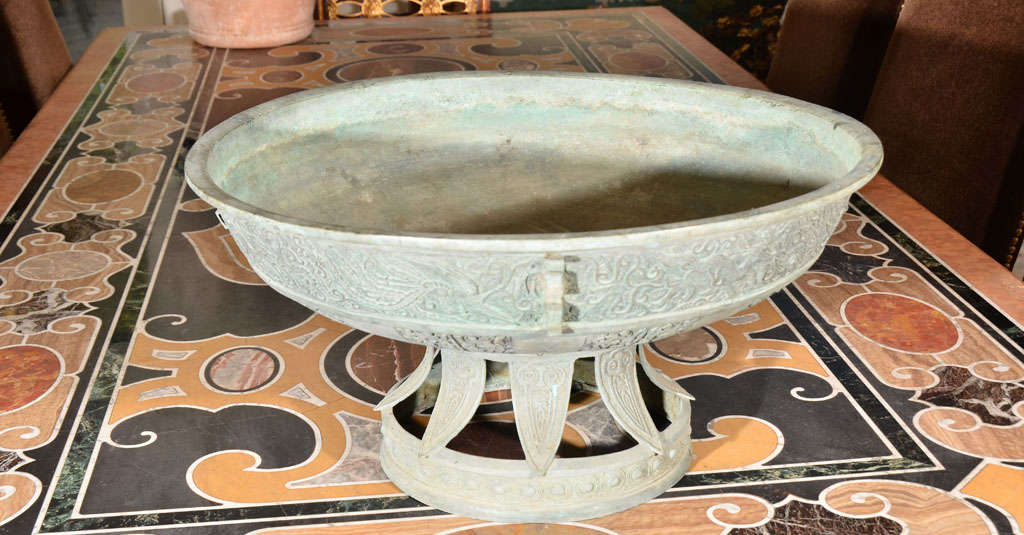 Incredible Large Japanese Archaistic Bronze Basin,<br />
Meiji Period, featuring phoenix and qiln.<br />
Provenance: The Carmen M. & Allen D. Christiansen Collection, Atherton, CA