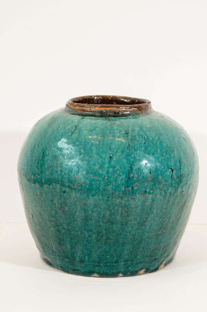 An antique Chinese ceramic ginger jar, circa 1900, with blue/green glaze.
Several available.
CR639