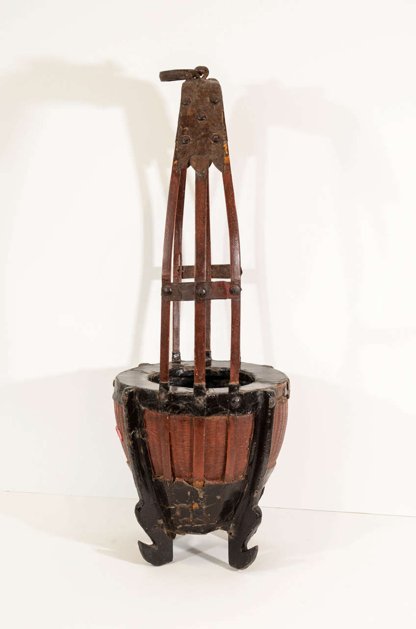 An unusual, intact willow and lacquer flower basket with original cast iron hanger. From Shanxi Province, c. 1850.
BT369