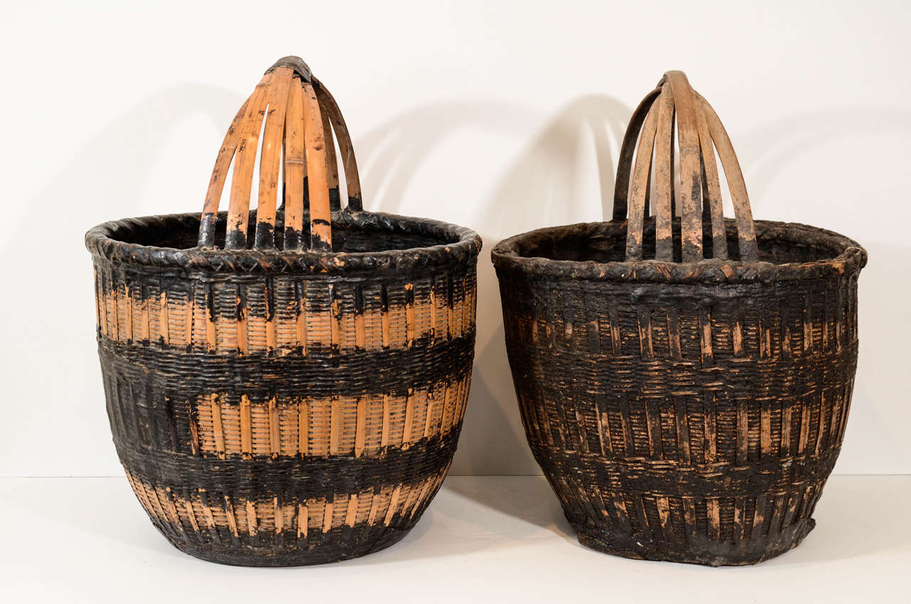 Antique Chinese woven willow food baskets, with striking natural black resin accents. From Shanxi Province, circa 1900.
Priced individually, sizes and coloring vary.
B429.
