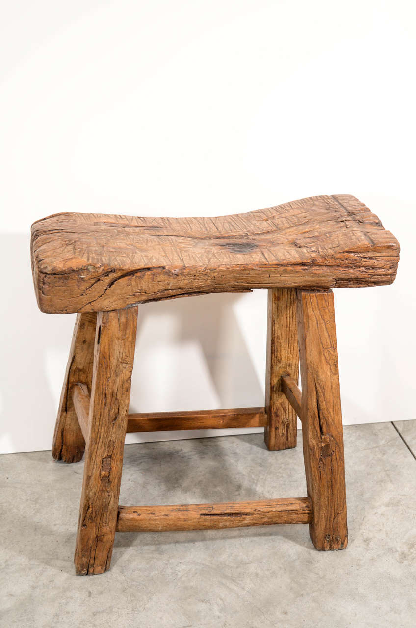 A large, thick seated antique Chinese elm stool, c.1900. Classically shaped, nicely weathered. From Shanxi Province.
S447