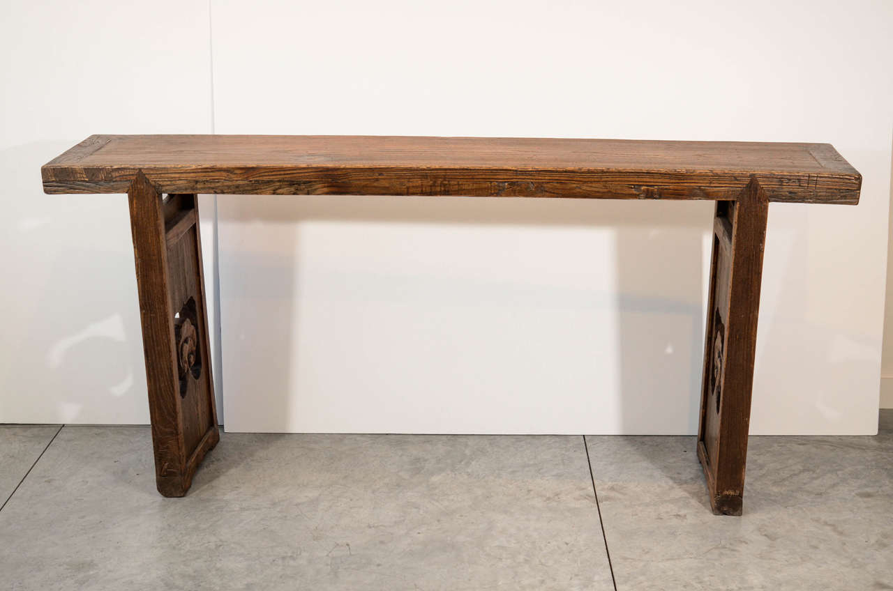 A 19th Century Chinese elm console from Shanxi Province.
Clean design includes thick wood top and carved legs.
T500.

