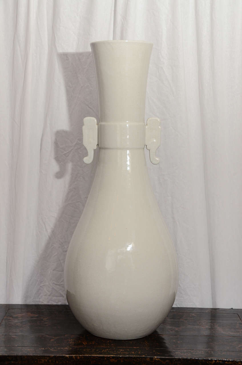Contemporary Chinese glazed ceramic Blanc de Chine palace vase.