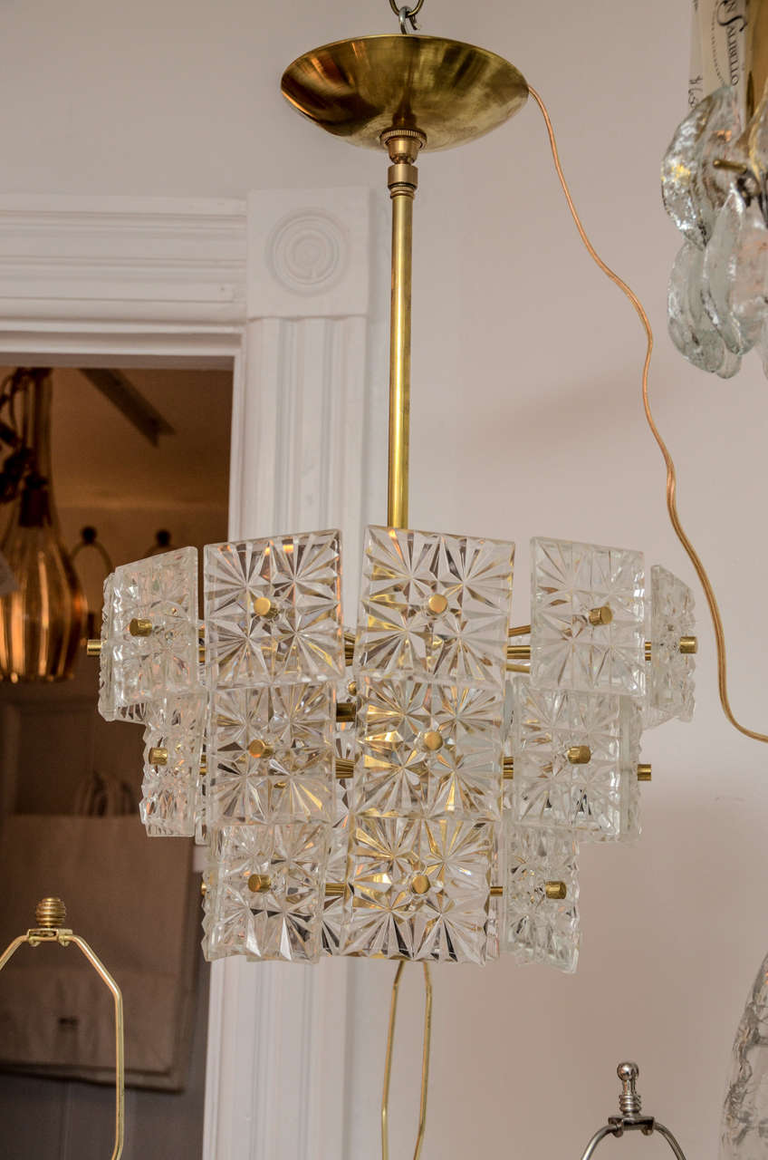 Beautiful Austrian Crystal brass chandelier with 3 newly wired ceramic edison recepticals.