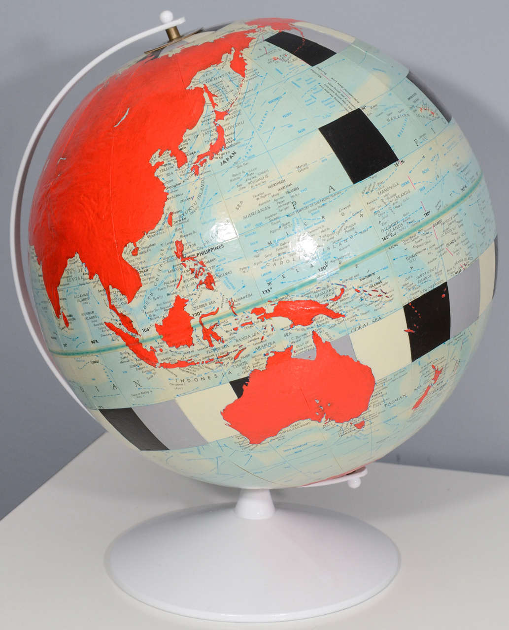 Vintage, hand-painted globe by contemporary pop artist, Dylan Egon.