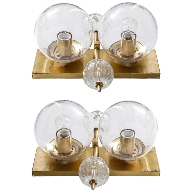 Set of Two Clear Glass Globes Sconces 1970's For Sale