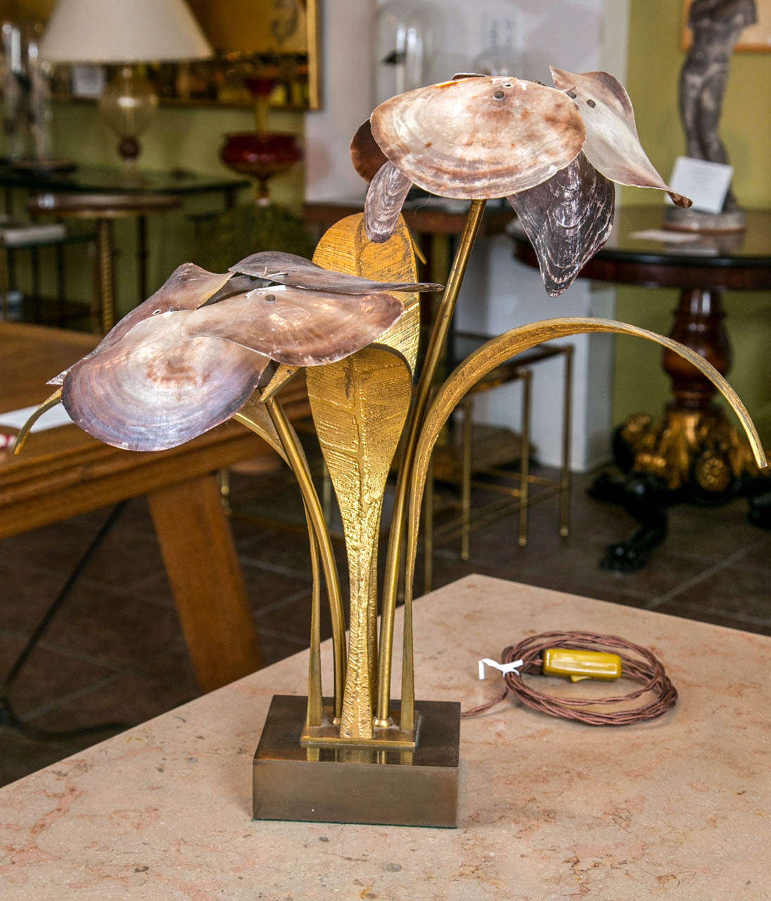 Unique bronze shell lamp by Willy Daro