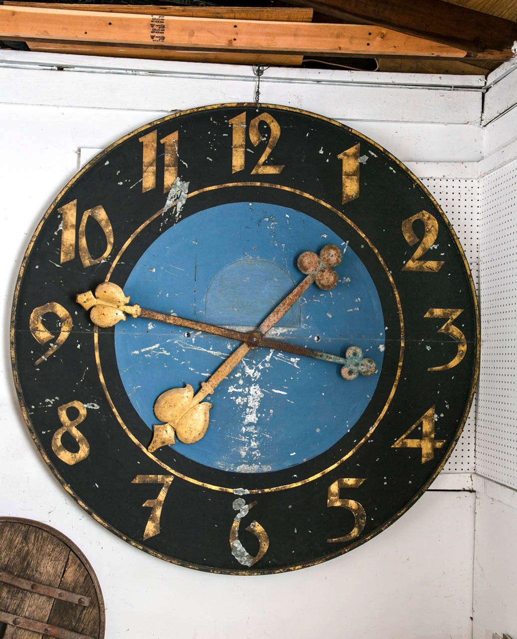The clock is from a railway station in the North of France, it is painted steel with gilt numbers and hands.