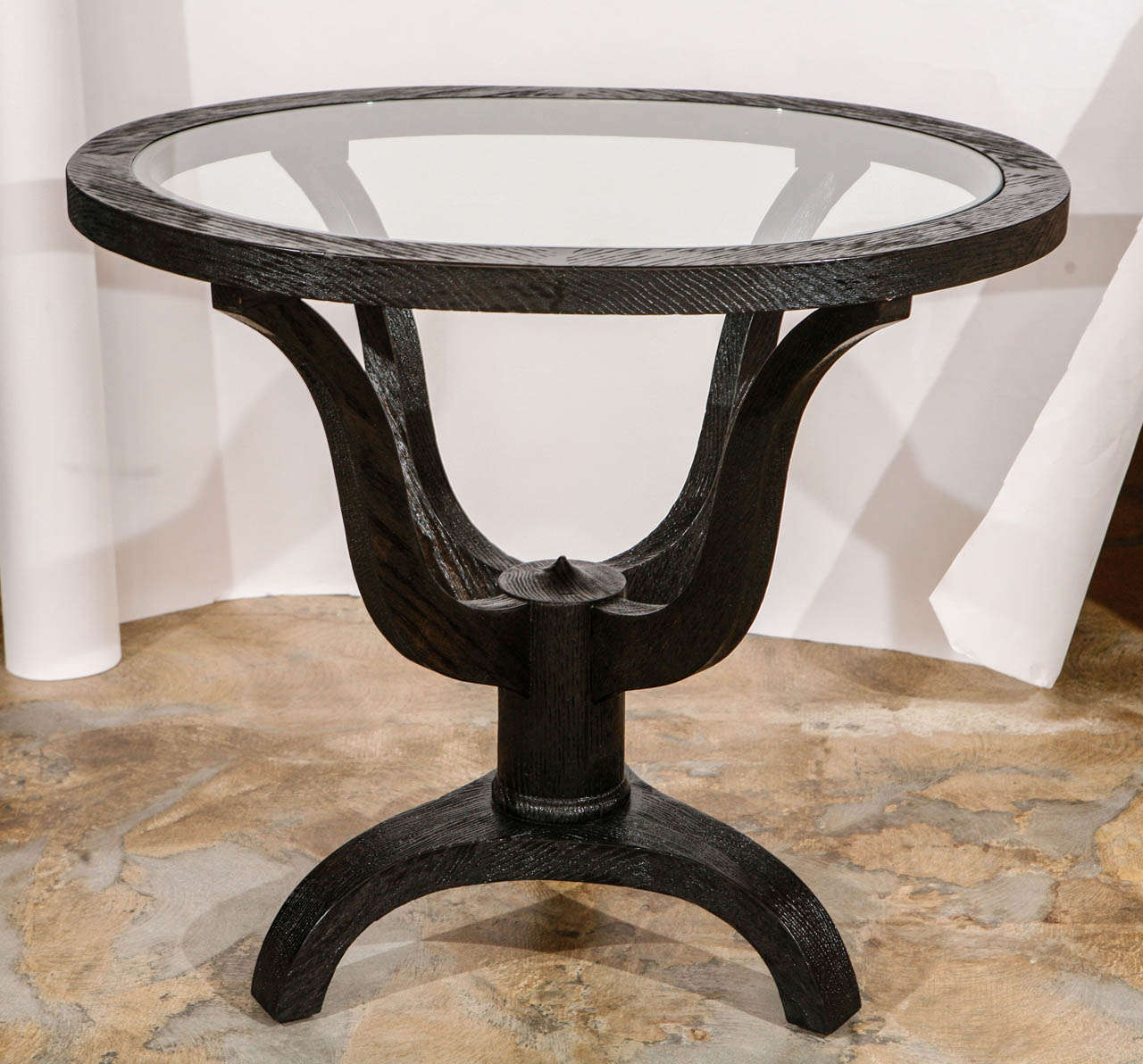 Larger oval oak side table (or smaller center table) has been finished in distressed ebony and with inset glass top.