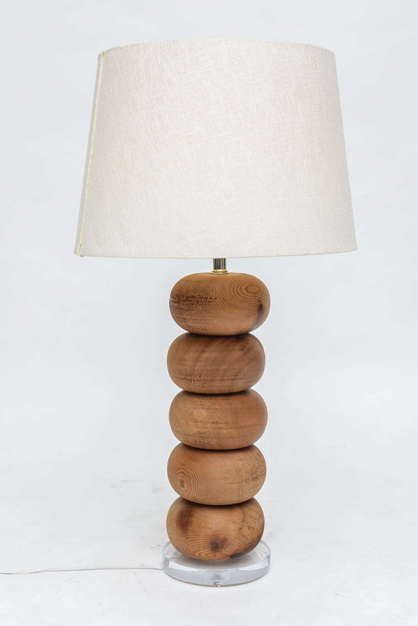 Pair of lamps with stacked, solid wood discs on lucite bases. Organic and modern… and fabulous! (Shades not included.)