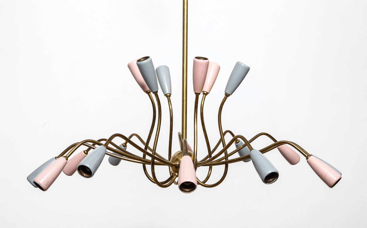 Stilnovo 1950s, eighteen-light ceiling fixture with additional decorative arms.
Brass chandelier with alternating grey and pink lacquered light elements. 
Very well condition with a nice patina to the brass.