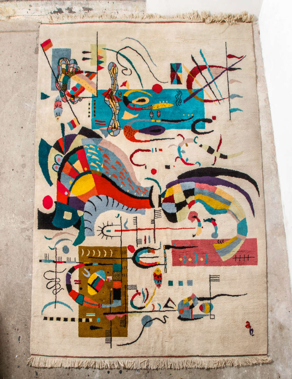 An Abstract Wool Rug/Tapestry in the style of Joan Miró