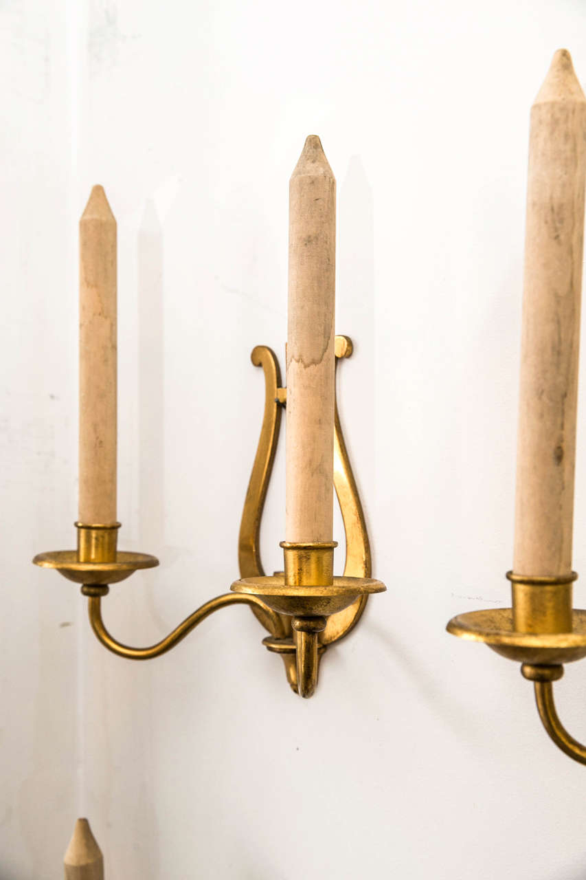 20th Century Set of Four Gilt Metal Candle Sconces with Wooden Faux Candles For Sale