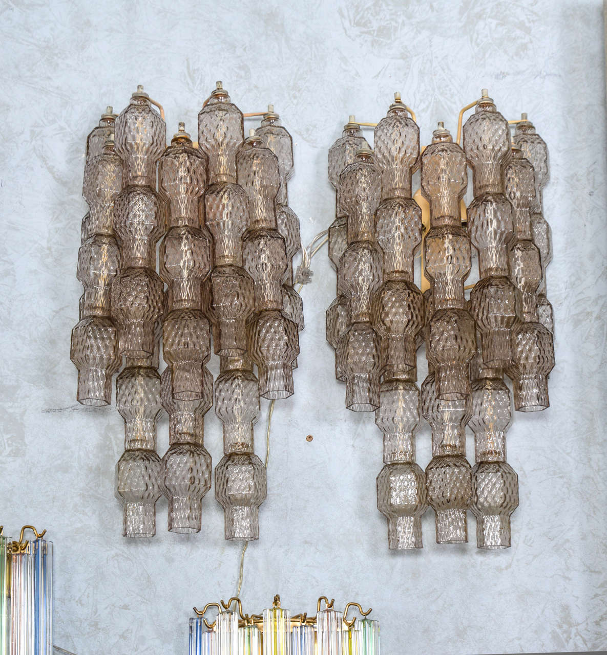 Pair of wall sconces in Murano glass.