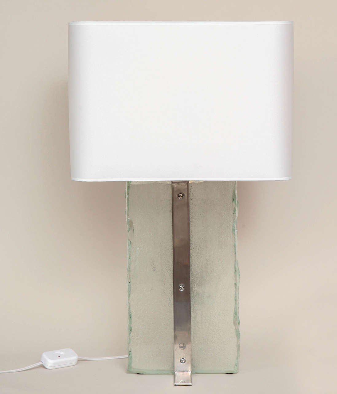 With a large glass slab which is smooth on one side and sand-blasted on the other supported by a nickeled brass Stand and with parchment paper shade. With sockets for two bulbs and with original French electrical components, but newly rewired to