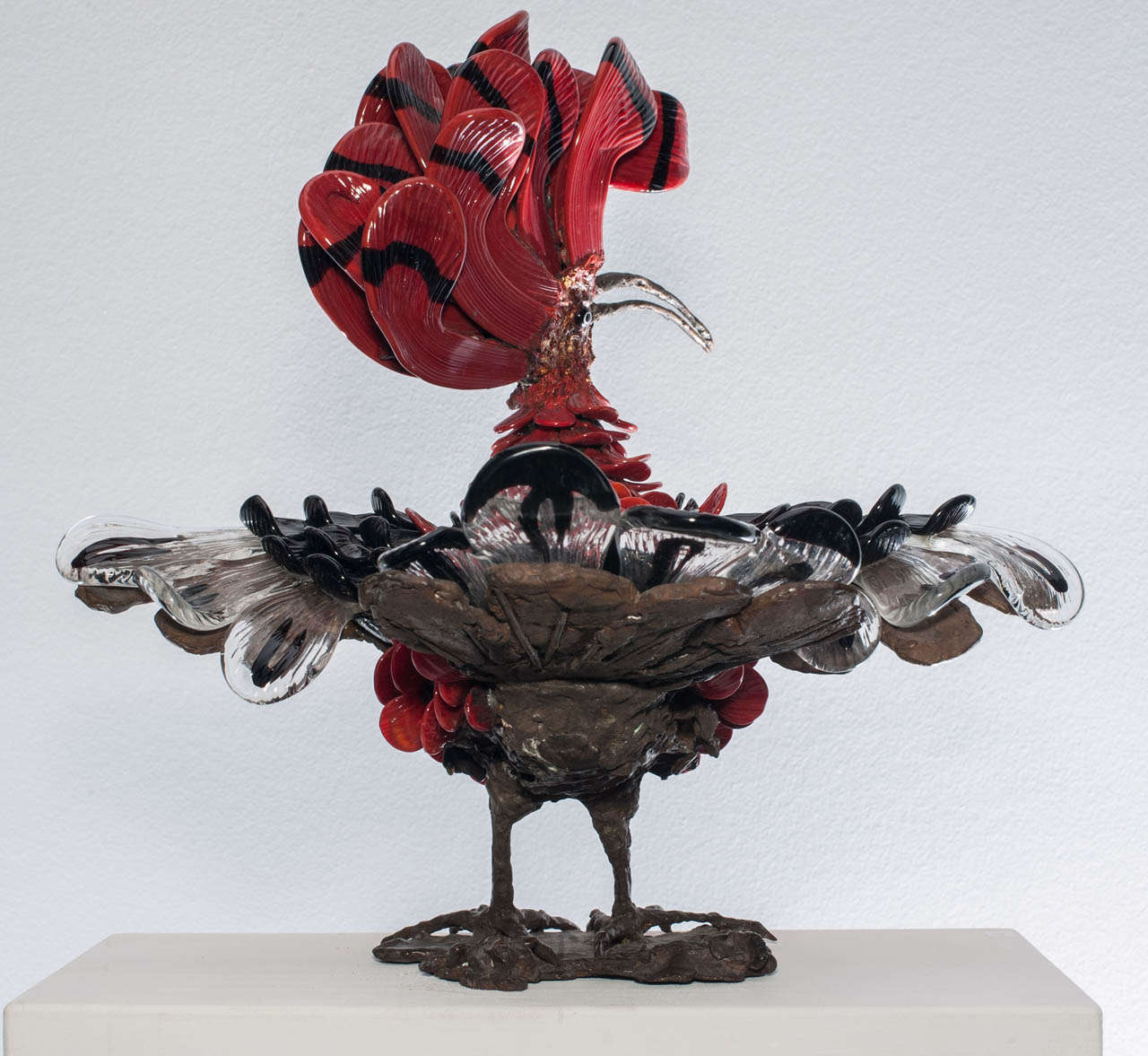 'Hoopoe' designed by Toni Zuccheri produced by Venini, Murano.
 Bronze sculpture and blown glass polychrome.