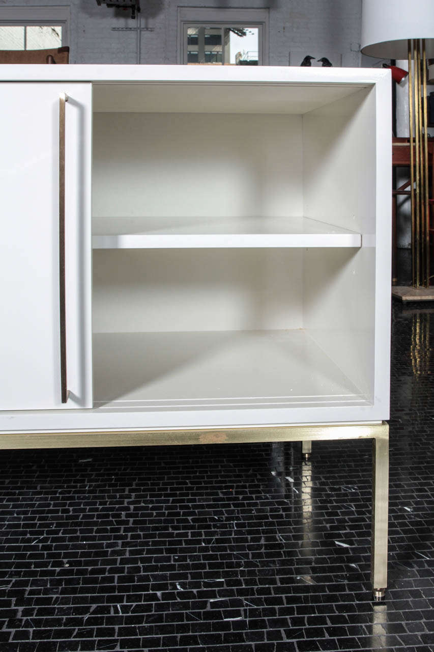 white and brass sideboard